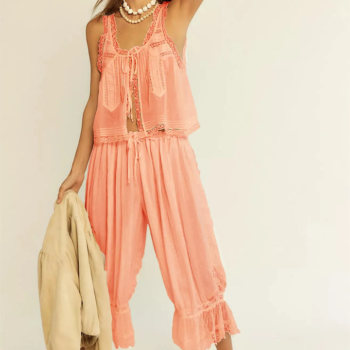 Women's peach cotton two-piece set with lace trim, wide-leg pants. Ideal for summer casual wear.