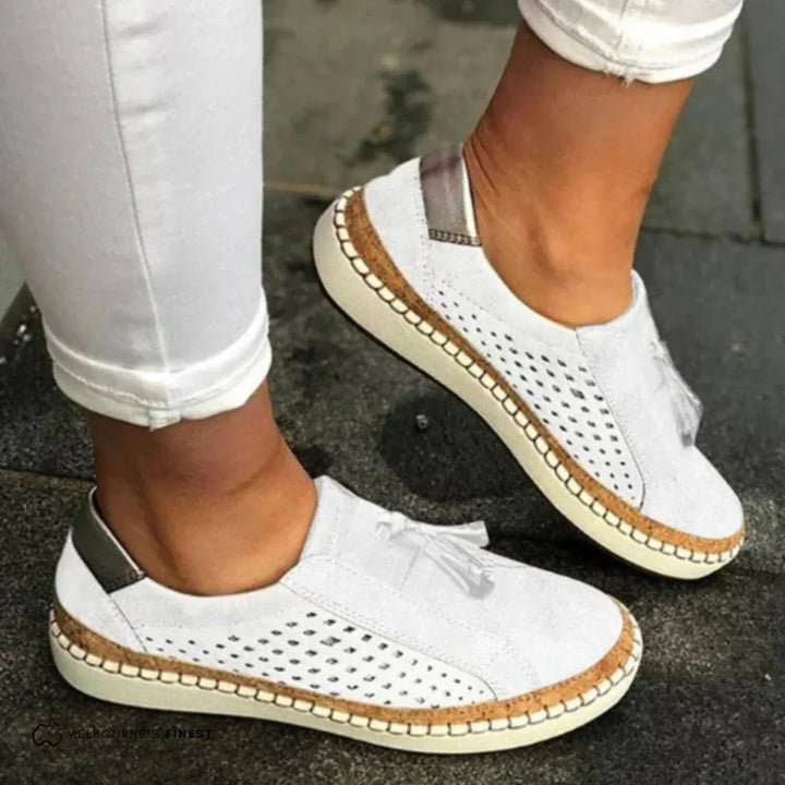 Breathable women's perforated slip-on shoes, perfect for warm weather and everyday comfortable wear.