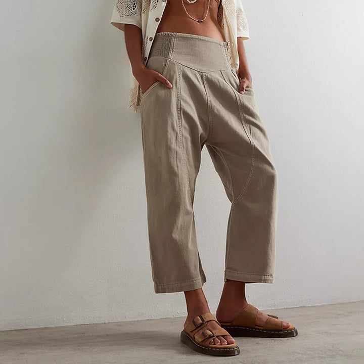 Women's relaxed cotton linen wide leg pants in a light, flowing fabric, perfect for summer casual wear.