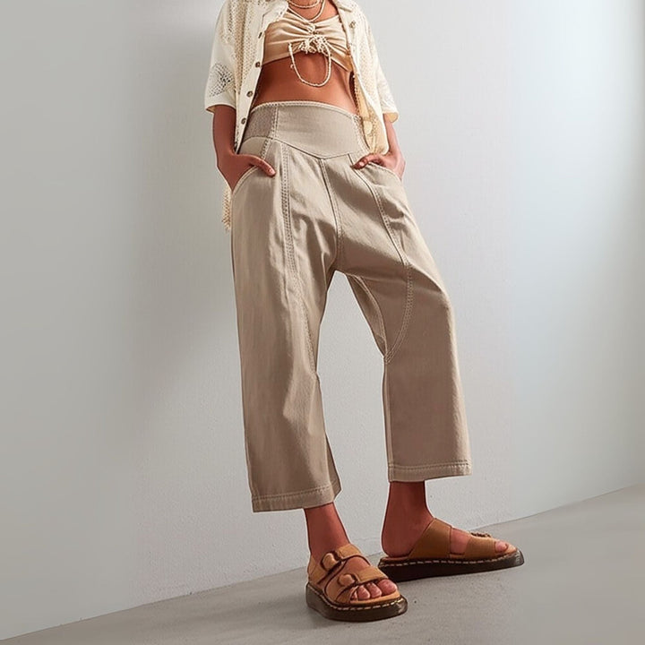 Relaxed fit women's pants featuring wide legs and a breathable cotton linen material, front view.