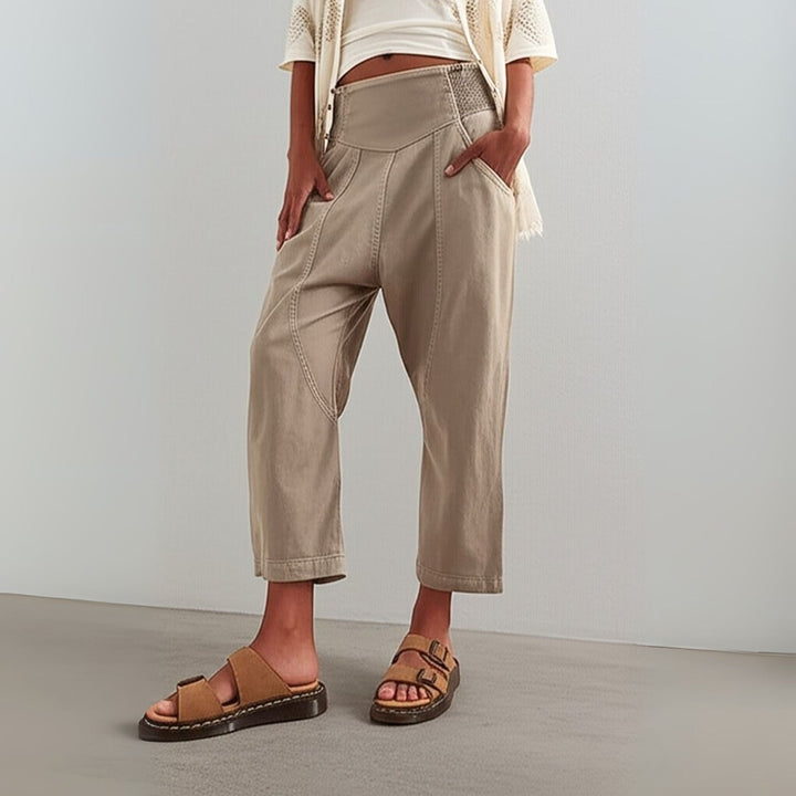 Casual women's cotton linen blend pants with wide legs, photographed in a light, natural setting.