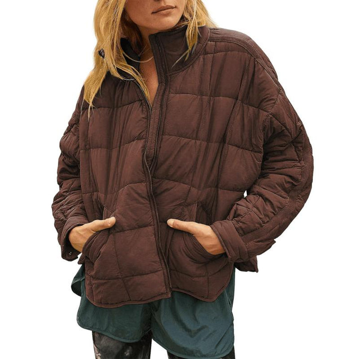 Stylish women's lightweight quilted jacket with a relaxed fit, ideal for casual winter outerwear.