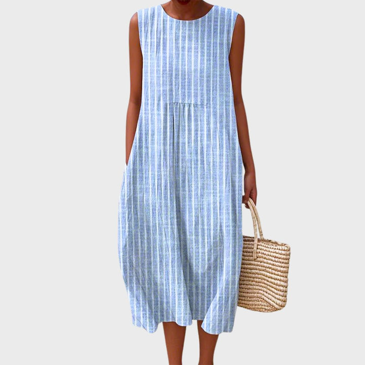 Crew neck women's sleeveless knee-length casual dress with a relaxed fit, great for summer comfort.