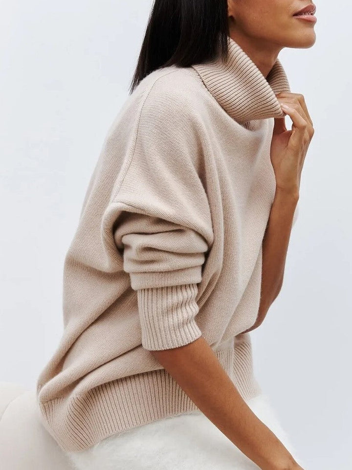 Merino blend oversized turtleneck sweater for women, offering a relaxed fit and ultimate comfort.