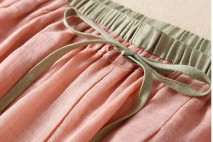 Model wearing women's relaxed fit linen trousers, demonstrating the comfortable and stylish cut.