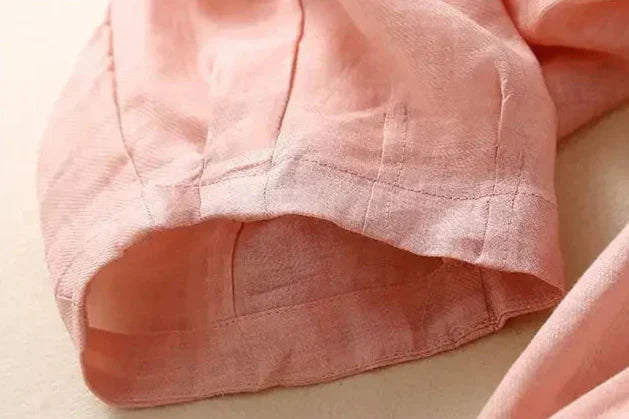 Women's summer fashion: Relaxed tapered linen trousers in a versatile color, easy to style.