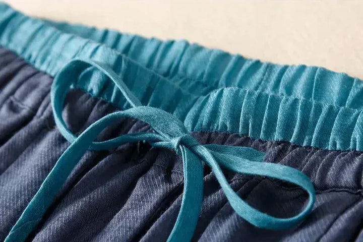 Essential women's summer pants: Relaxed tapered linen trousers designed for comfort and style.