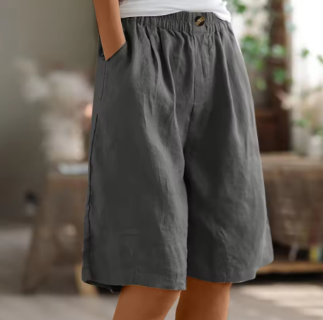 Comfortable women's wide leg Bermuda shorts with an elastic waistband, perfect for warm weather adventures.