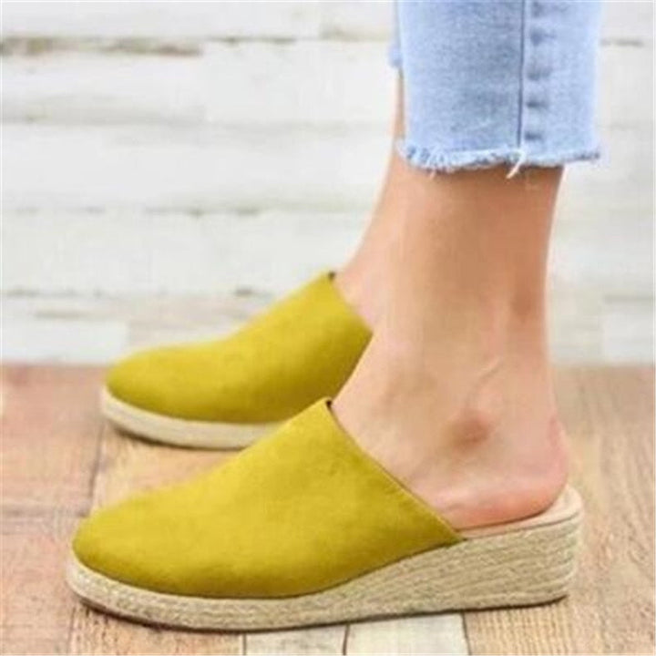 Comfortable retro chic wedge sandals with a stylish design for women's summer casual wear.