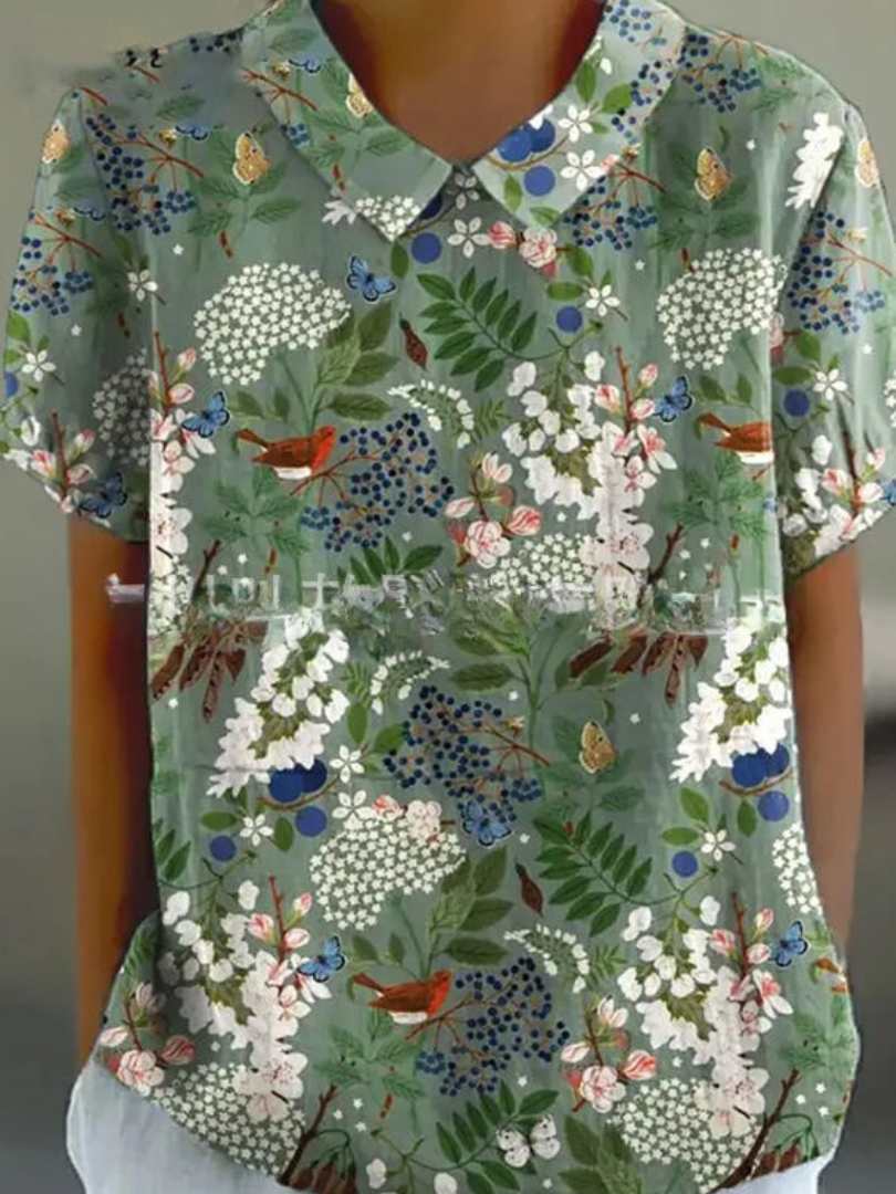 Versatile women's short sleeve floral embroidered top, blending retro charm & comfortable fit.