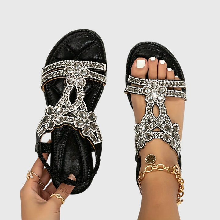 Glamorous rhinestone flat sandals for women, perfect for summer outfits.