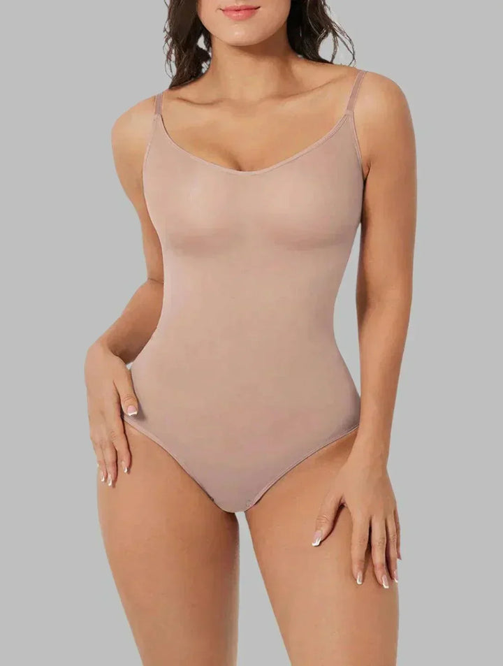 Women's full-body shapewear bodysuit for seamless tummy control, waist definition & butt lifting.