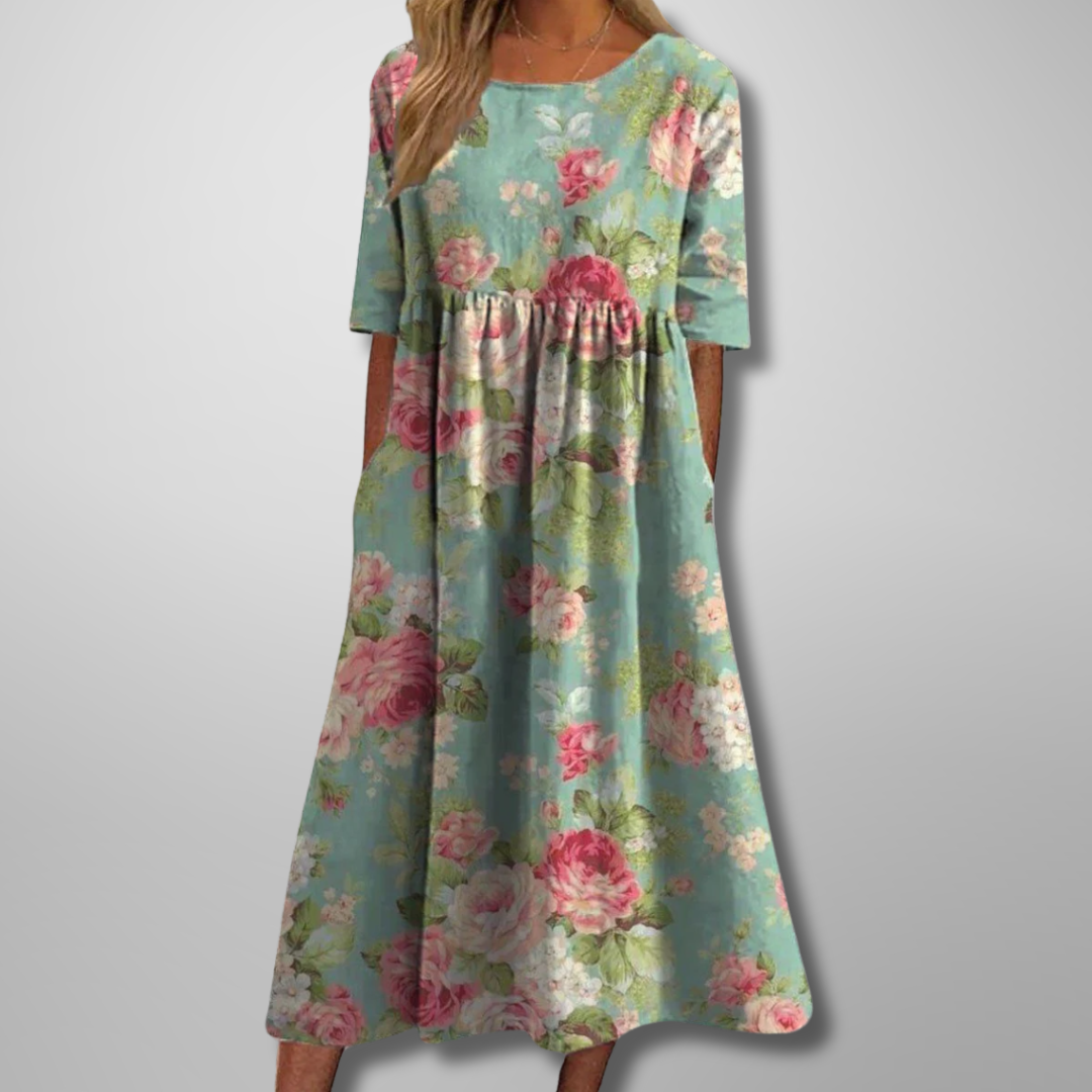 Comfortable women's loose fit midi dress with short sleeves & botanical print, ideal for everyday wear.