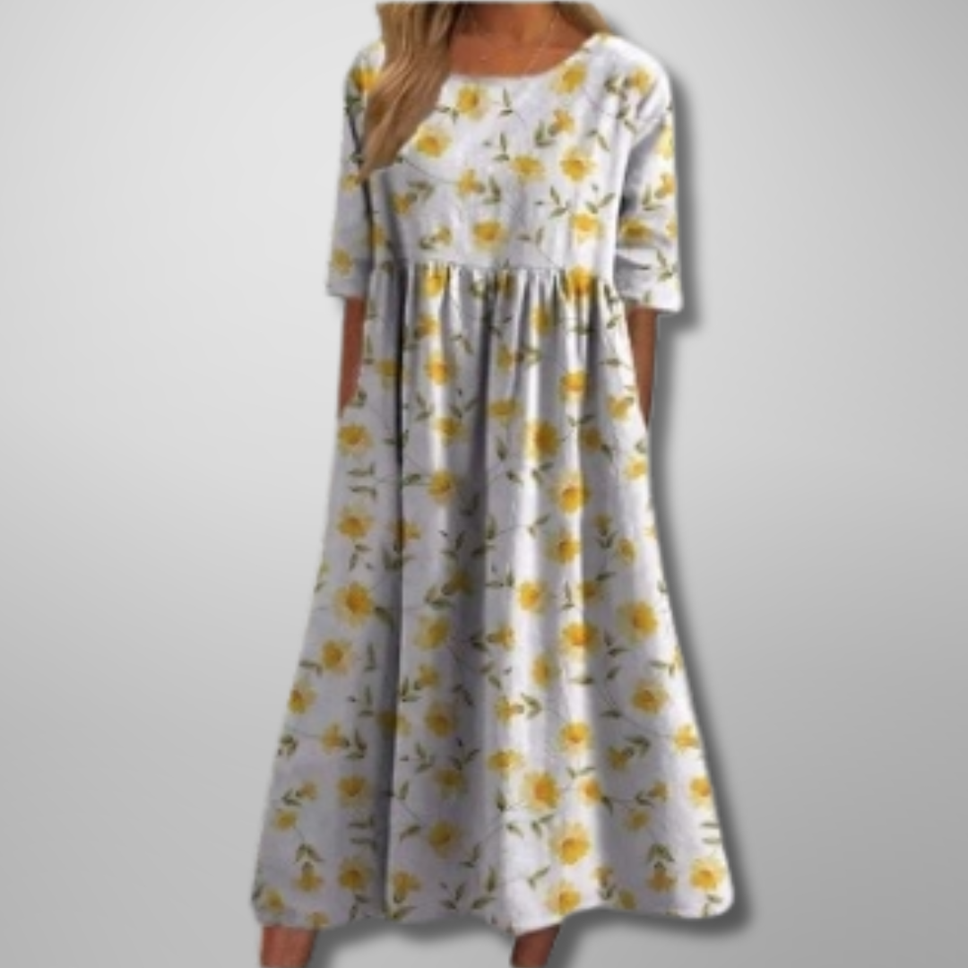 Stylish women's short sleeve botanical print midi dress, offering a relaxed loose fit for ultimate comfort.
