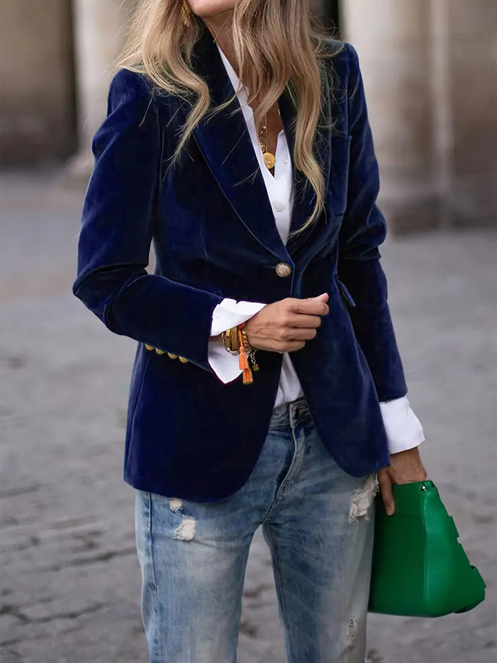 Chic women's tailored blazer, slim fit, featuring sophisticated gold buttons and a sharp peak lapel.