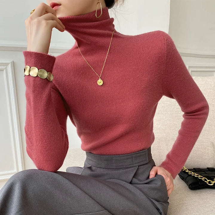 Cozy women's slim fit turtleneck sweater with long sleeves, ideal for versatile winter wear.