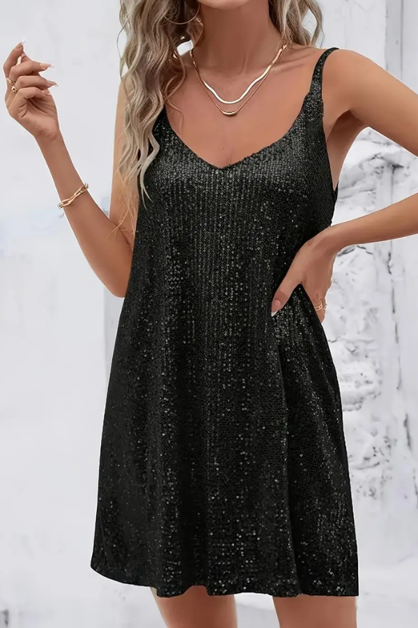Sleeveless sparkling sequined V-neck mini dress. Chic women's fashion for parties, cocktails & events.