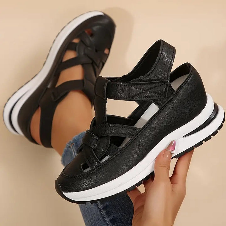 Trendy women's platform sandals featuring a modern cutout design, open toe, ideal for summer style.