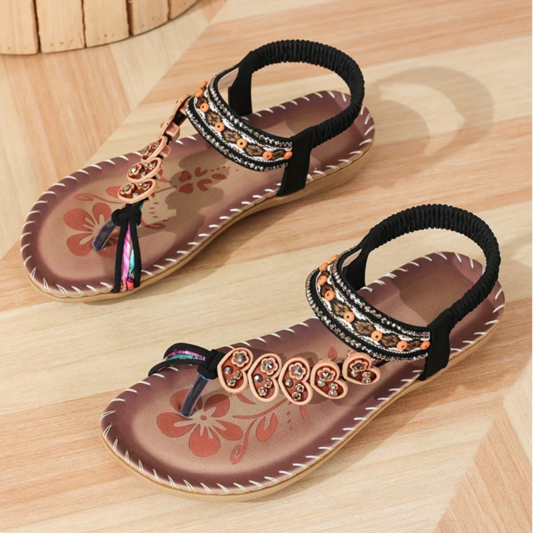 Stylish women's comfortable sandals for everyday wear. Chic open-toe slip-on summer shoes.