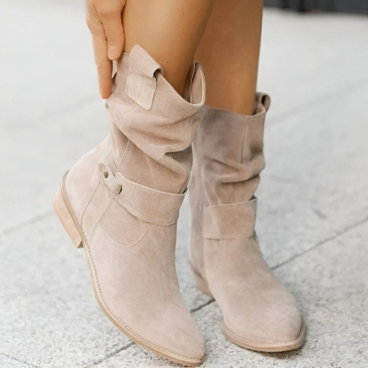 Pair of comfortable women's ruched ankle boots, great for versatile everyday and fall outfits.