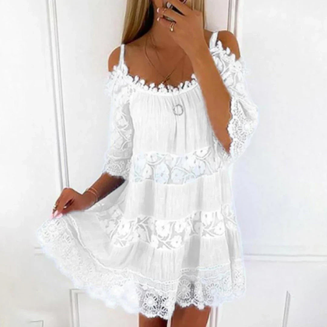 Lightweight women's cold shoulder mini dress, ideal for summer beachwear, featuring charming crochet & embroidery.