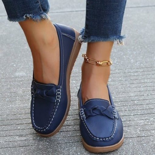 Women's supportive slip-on walking loafers for everyday comfort with arch support.
