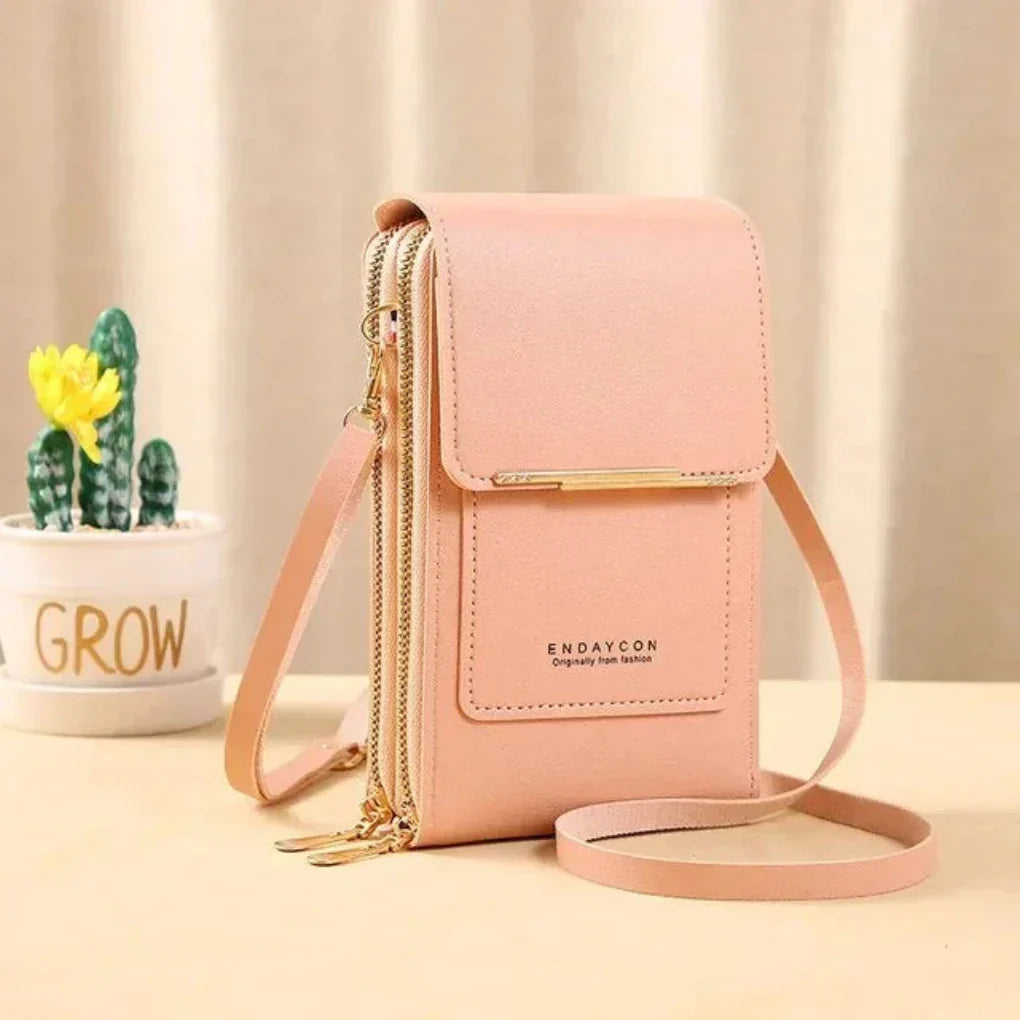 Fashionable compact hands-free phone bag for women. Securely holds your smartphone & small essentials.