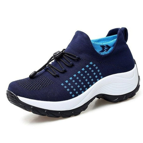 Women's ultra-comfort slip-on sneakers with stretch fabric and cushioned sole, perfect for walking.