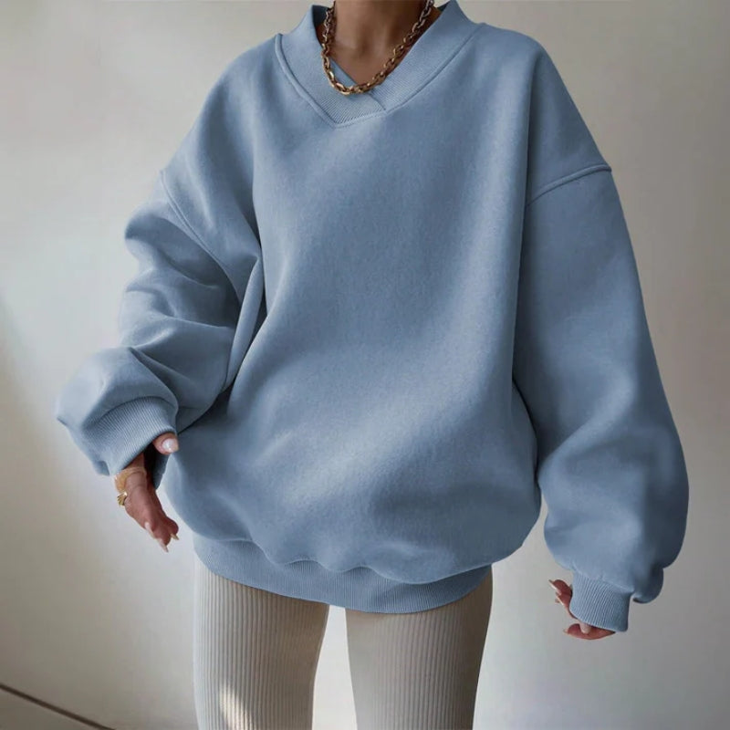 Casual women's pullover top, oversized grey knit with long sleeves, offering ultra-soft comfort and everyday fashion.