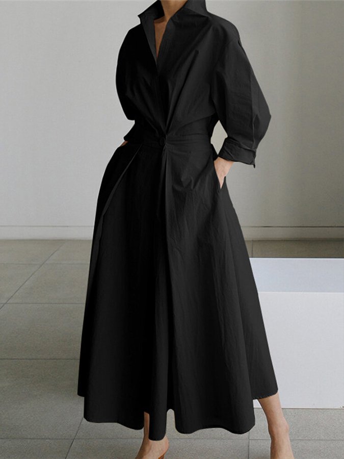 Women's V-neck A-line midi dress. Flattering, versatile, and includes convenient pockets.