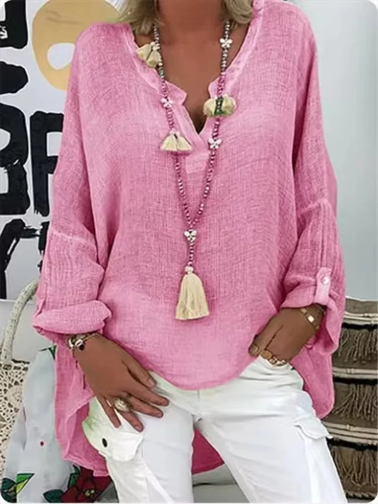 Versatile women's V-neck long sleeve blouse with roll-tab sleeves, relaxed fit for fashion & comfort.