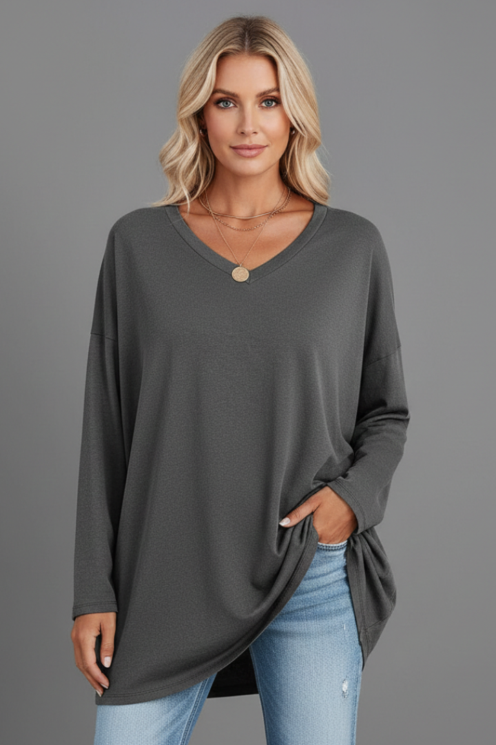 Elegant V-neck long sleeve women's top, relaxed fit for comfortable and stylish versatile wear.
