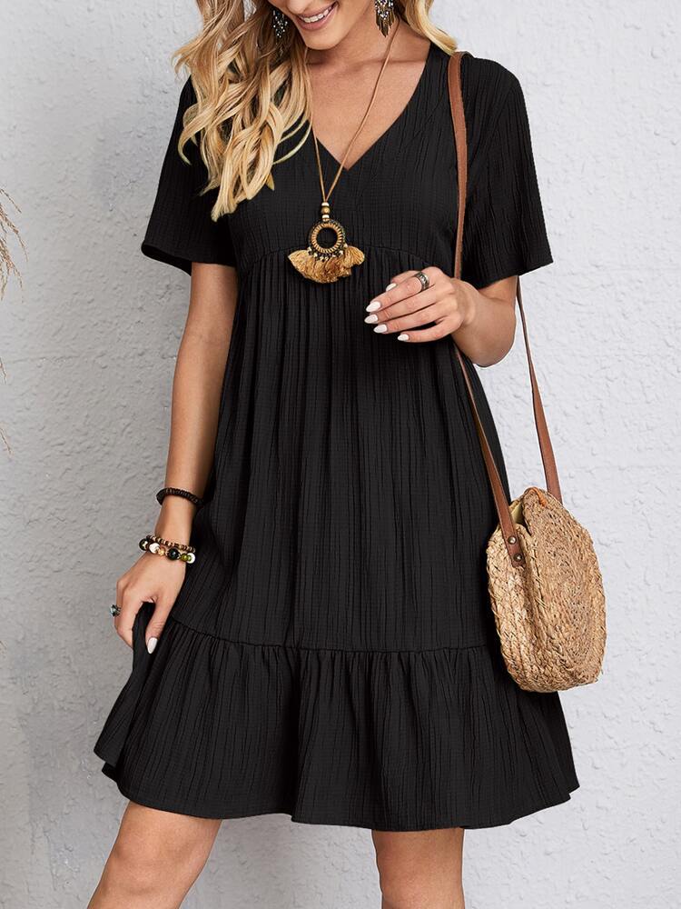 Flowy tiered swing mini dress, V-neck, short sleeve design. Versatile women's casual summer fashion.
