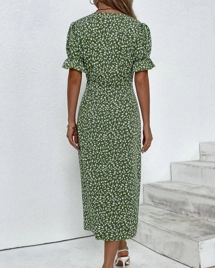 Beautiful women's floral print V-neck wrap midi dress, short sleeves, for spring/summer fashion.