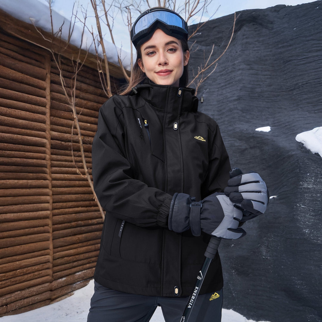Woman walking her dog, well-equipped with her Verona 3-in-1 waterproof jacket, ready for any weather.