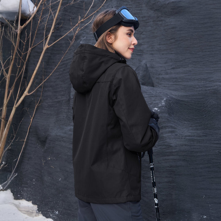 Close-up on the storm flap fasteners of the Verona 3-in-1 women's jacket for extra weather protection.