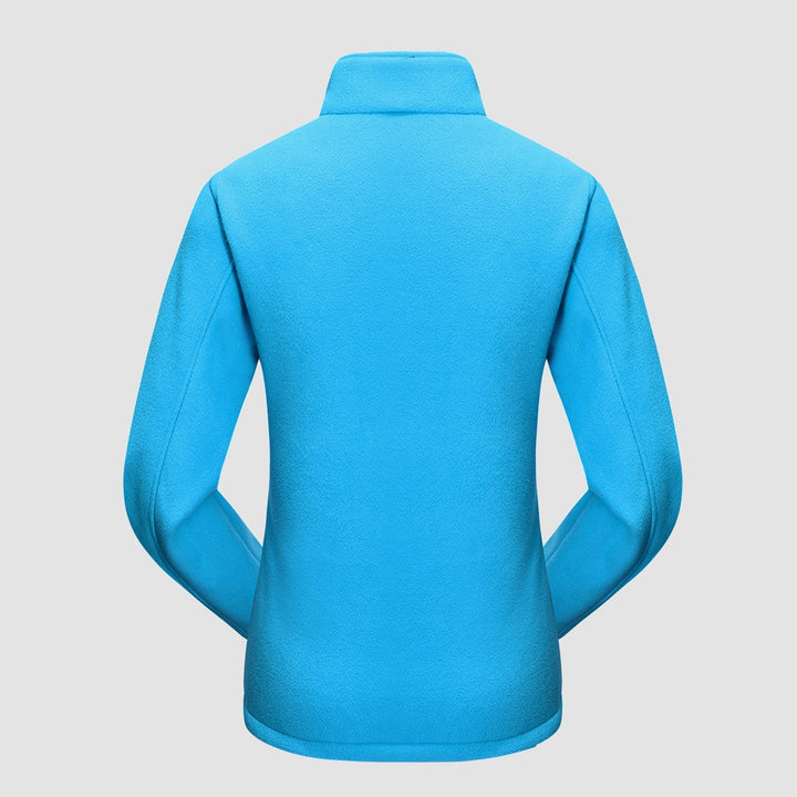 Couple enjoying a stroll, woman wearing her Verona 3-in-1 waterproof jacket, comfortable and practical.