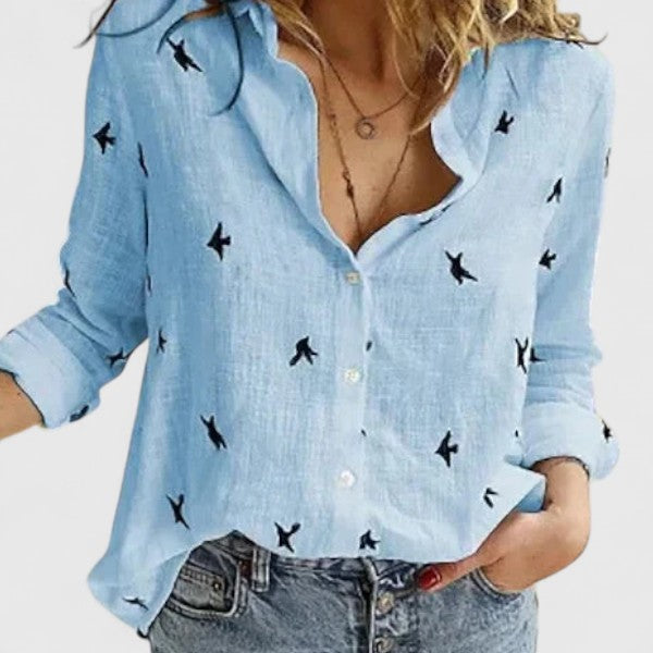 Elegant women's lapel collar top, a classic button down blouse for various occasions.