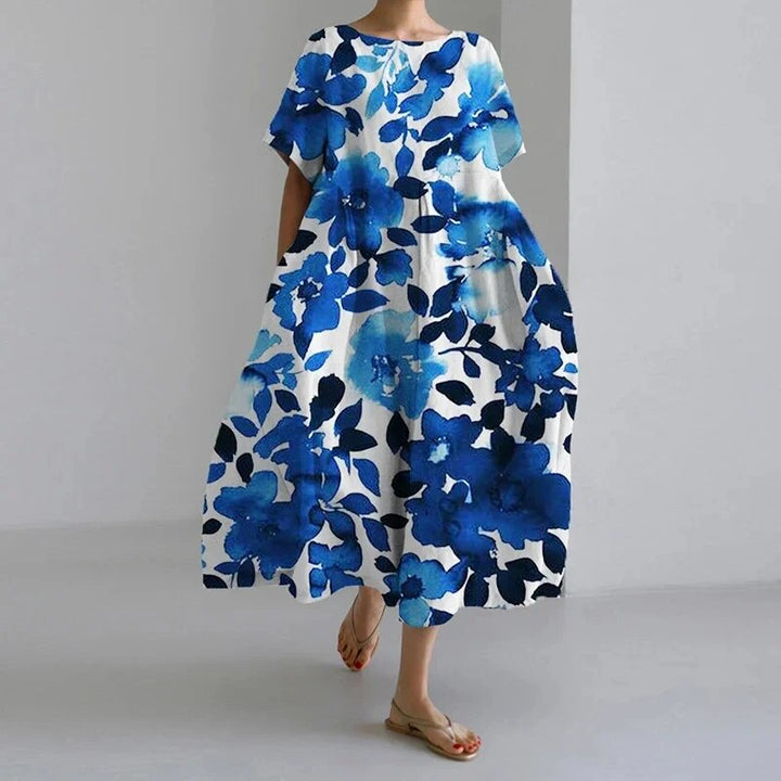Gorgeous women's vibrant floral maxi dress, a must-have flowy summer statement for casual comfort.