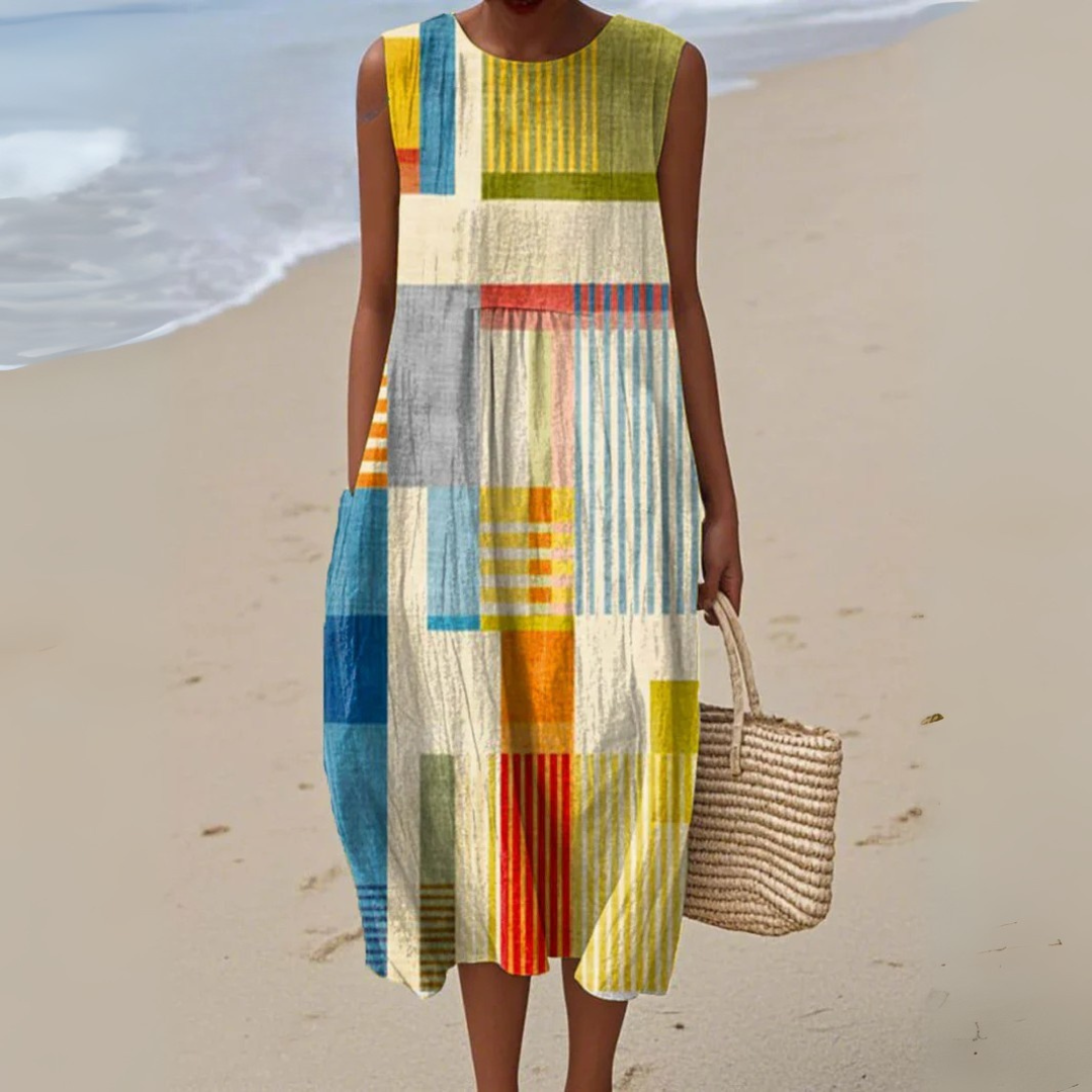Women's vibrant geometric print A-line summer dress, sleeveless, perfect for casual beach or vacation wear.