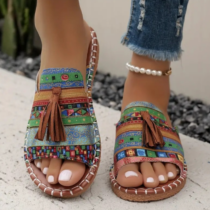 Women's comfortable everyday flat sandals, featuring a vibrant design for casual summer fashion.