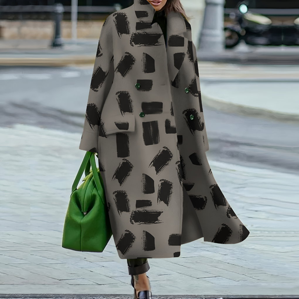 Ultimate weather protection with this women's waterproof long coat, featuring a secure button closure.