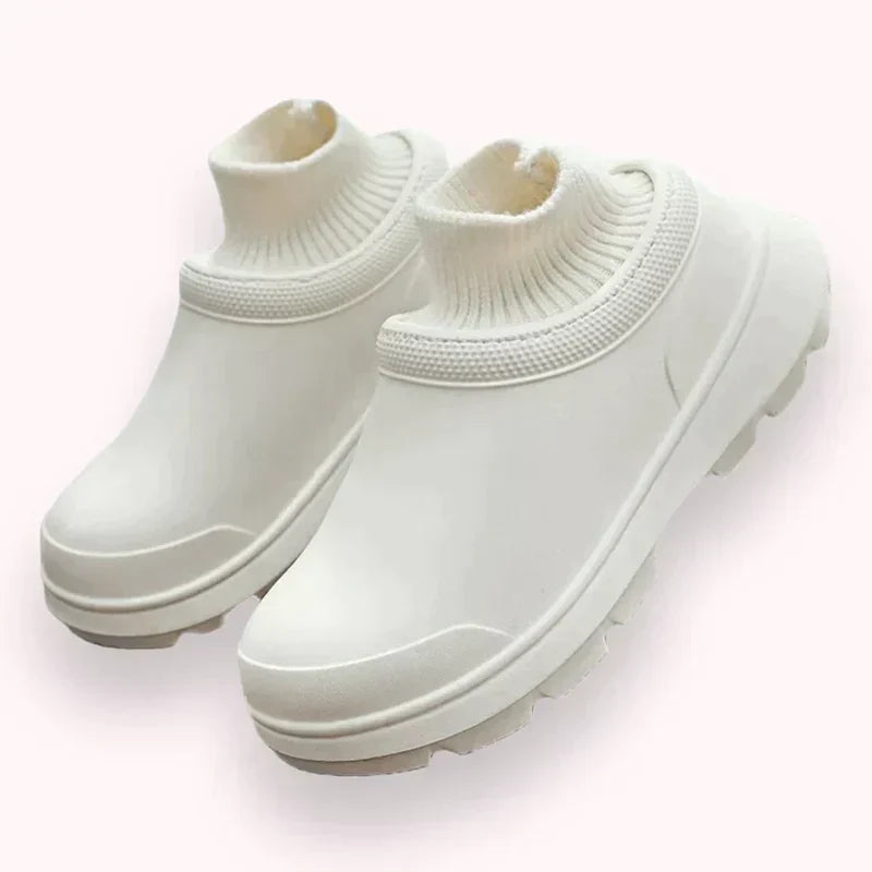 Cozy women's waterproof slip-on clogs, Madeline style, with soft ankle cuff & supportive non-slip sole for walking.