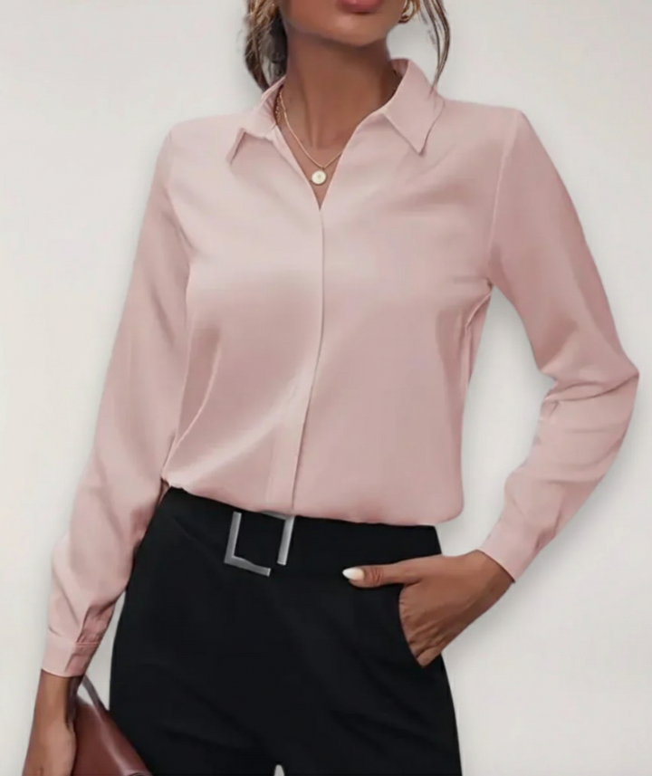 Fashionable women's spring buttoned blouse, an elegant long-sleeve top for professional settings.