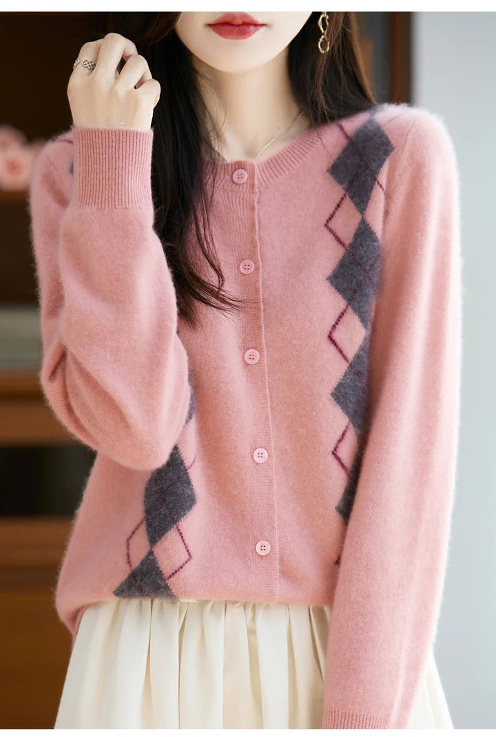 Warm women's wool knit cardigan with intricate diamond stitching and O-neck, button front closure.