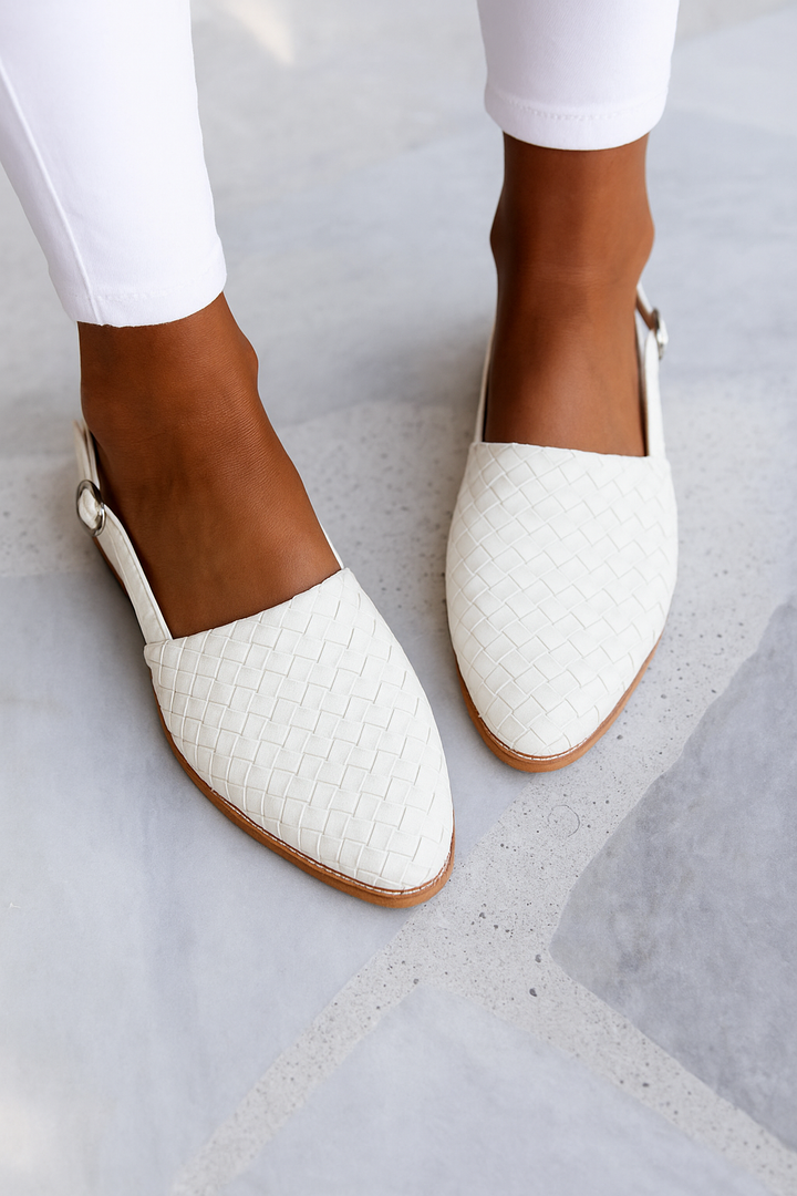 Stylish women's backless mules, closed toe woven design, perfect for relaxed spring & summer fashion.