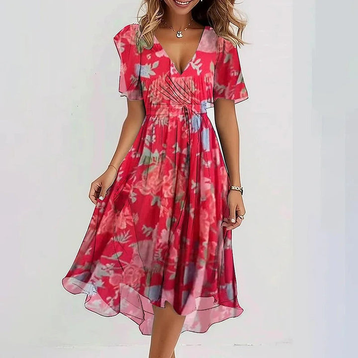 Stylish women's wrap V-neck midi dress with flutter sleeves, perfect for a flowing, comfortable look.