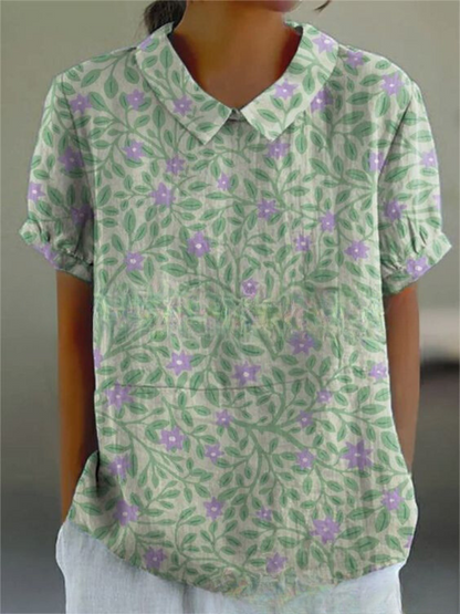 Women's blouse with short gathered sleeves, pointed collar, relaxed fit, perfect for spring-summer style and comfort.