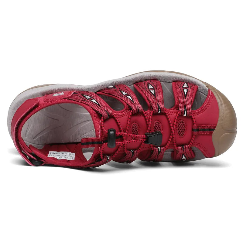 Women's blue sport sandal with cotton webbing, elastic lace, cushioned arch, and rubber soles for hiking and outdoor activiti
