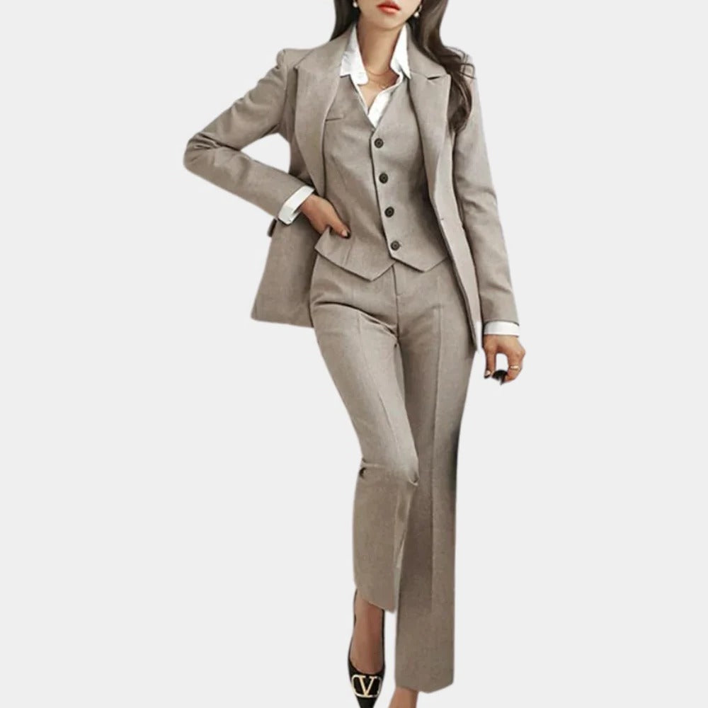 Women's elegant 3-piece suit set with blazer, waistcoat, and trousers in a classic polished design for versatile wear.